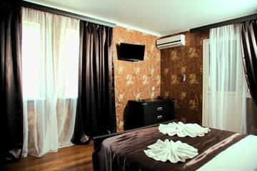 Люкс с балконом в Отеле Hotel-Club Poseidon